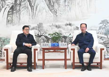 丁焰章与内蒙古电力集团董事长张海峰、总经理