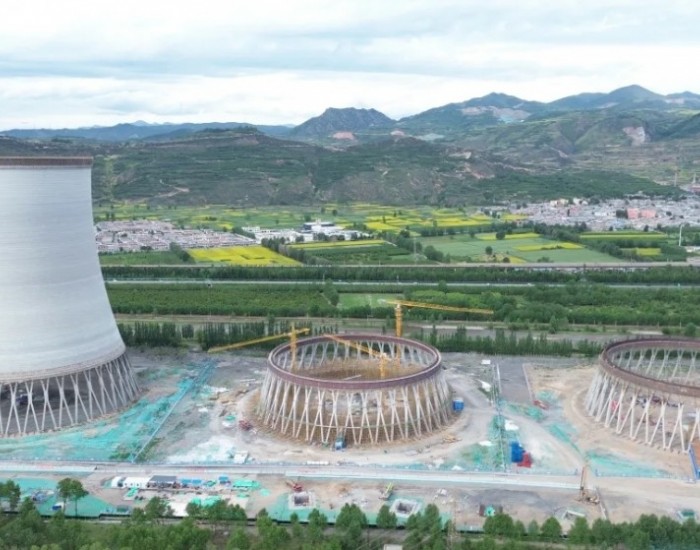 青海省投3×660兆瓦（上大压小）火电机组项目烟塔<em>工程项目</em>1号间冷塔顺利到顶