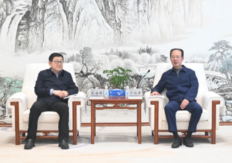 丁焰章与内蒙古电力集团董事长张海峰、总经理张晓