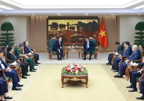 周家义拜会越南总理范明政