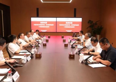 周毅与中煤天津公司党委书记、执行董事张建军座谈交流