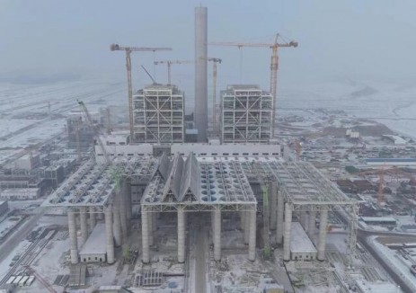 新疆国能博州项目1号机组发电机定子顺利完成就位