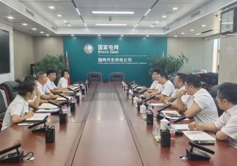 中国能建辽宁院党委书记、董事长何赞峰与国网丹东供电公司总经理、党委副书记纪勇座谈交流